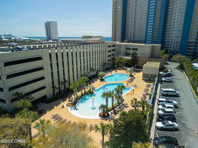 14701 Front Beach Rd Unit 1033, Panama City Beach, FL 32413 - drone / aerial view of a pool area and a large body of water