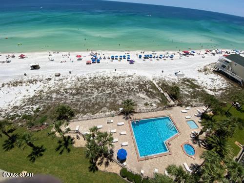 aerial view featuring a view of the beach and a water view