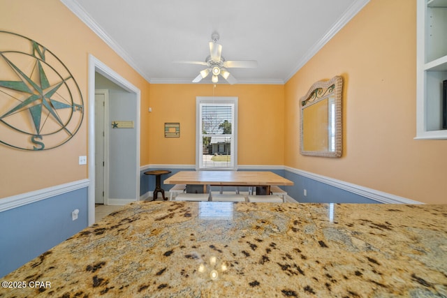14205 Millcole Ave, Panama City Beach, FL 32413 - interior space with light stone countertops, a ceiling fan, and ornamental molding