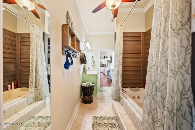 14205 Millcole Ave, Panama City Beach, FL 32413 - full bath with ornamental molding, a ceiling fan, tile patterned floors, and a tub with jets