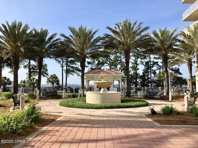 view of community featuring fence