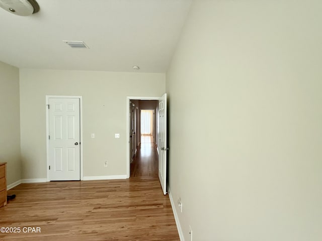 2557 Woods View Dr, Marianna, FL 32446 - interior space featuring baseboards and light wood-style flooring