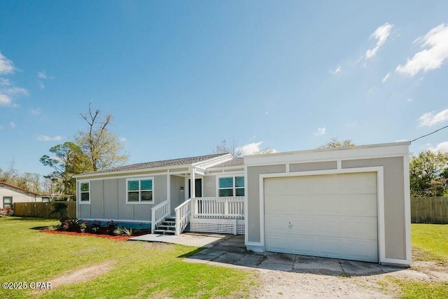 view of front facade featuring board and batten siding, covered porch, a front yard, fence, and driveway