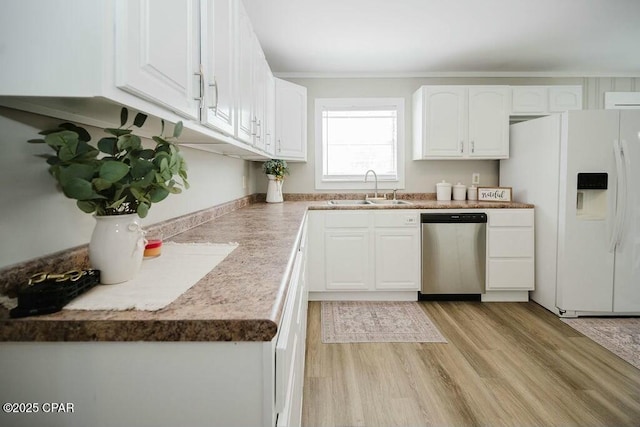kitchen with dishwasher, a sink, light wood-type flooring, white cabinetry, and white refrigerator with ice dispenser