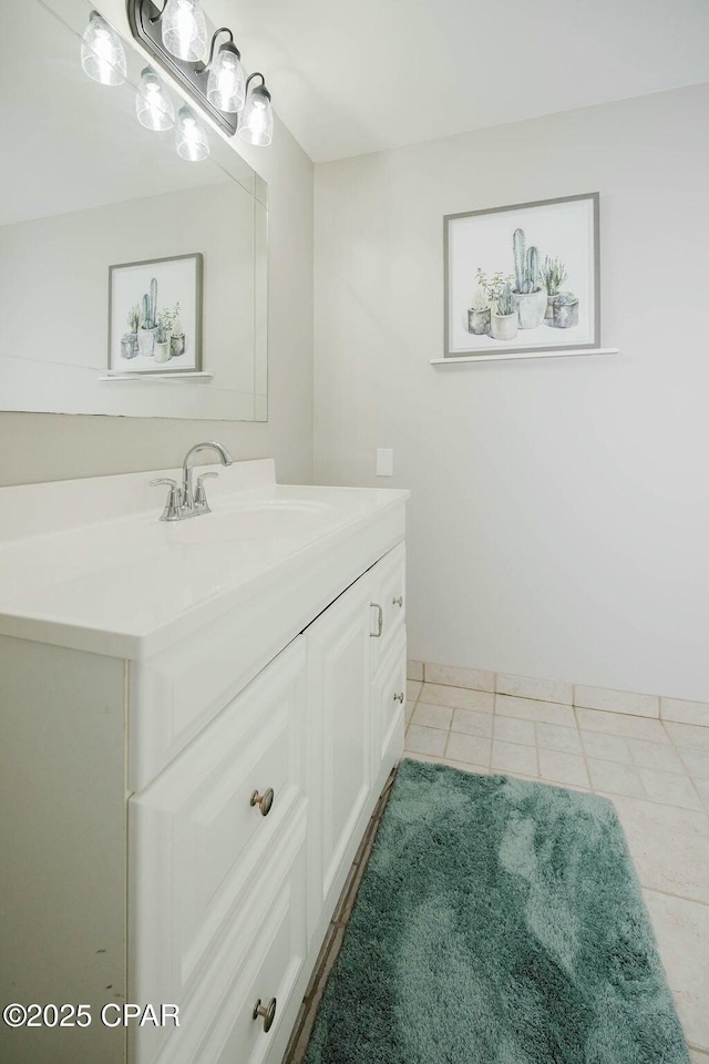 bathroom featuring tile patterned floors and vanity