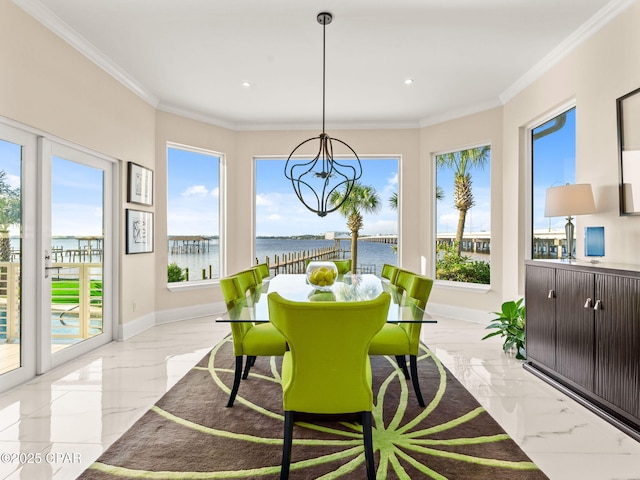 103 Harbour Pointe Dr, Lynn Haven, FL 32444 - sunroom with a chandelier, marble tiled flooring, recessed lighting, a water view, and baseboards