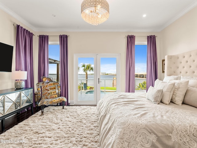103 Harbour Pointe Dr, Lynn Haven, FL 32444 - bedroom featuring access to outside, a chandelier, ornamental molding, wood finished floors, and a water view