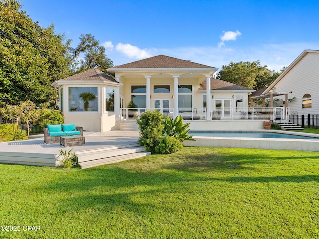 103 Harbour Pointe Dr, Lynn Haven, FL 32444 - rear view of property featuring stucco siding, an outdoor hangout area, and a deck