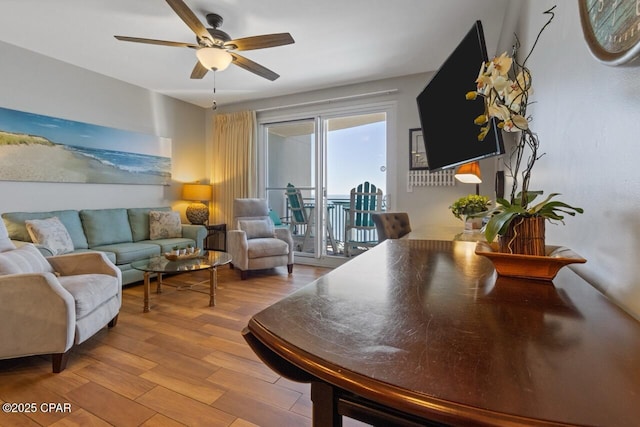 16701 Front Beach Rd Unit 1803, Panama City Beach, FL 32413 - living room featuring a ceiling fan and wood finished floors