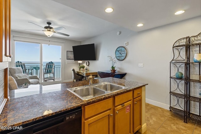 16701 Front Beach Rd Unit 1803, Panama City Beach, FL 32413 - kitchen featuring a sink, dishwasher, ceiling fan, brown cabinets, and light tile patterned flooring