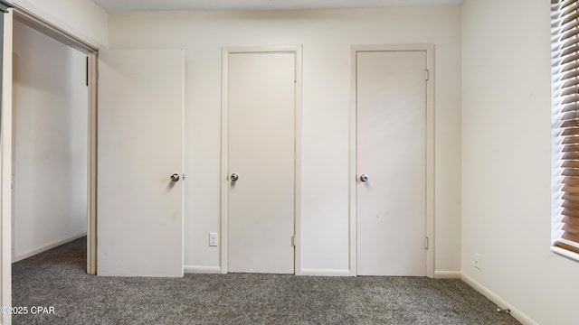 810 Virginia Ave, Lynn Haven, FL 32444 - unfurnished bedroom featuring carpet flooring