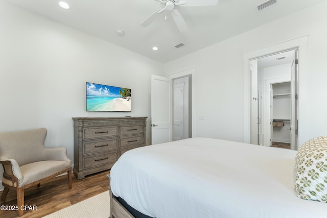 bedroom with visible vents, wood finished floors, ceiling fan, and recessed lighting