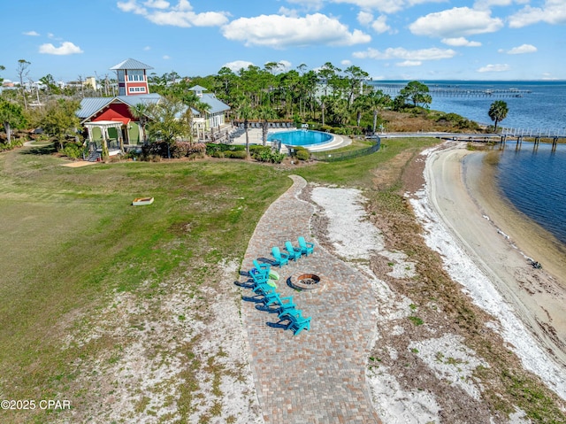 birds eye view of property featuring a water view