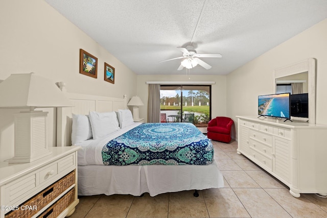 520 N Richard Jackson Blvd Unit 1804, Panama City Beach, FL 32407 - bedroom featuring a textured ceiling, light tile patterned flooring, ceiling fan, and access to outside