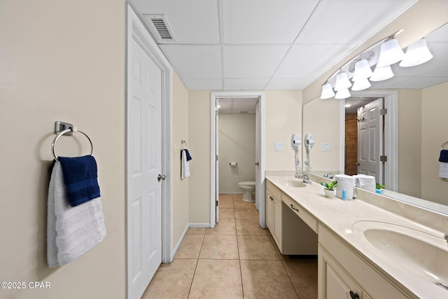 520 N Richard Jackson Blvd Unit 1804, Panama City Beach, FL 32407 - bathroom with double vanity, toilet, tile patterned flooring, and baseboards