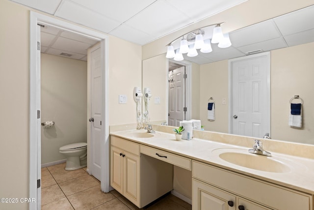 520 N Richard Jackson Blvd Unit 1804, Panama City Beach, FL 32407 - full bath featuring a paneled ceiling, double vanity, toilet, and tile patterned flooring