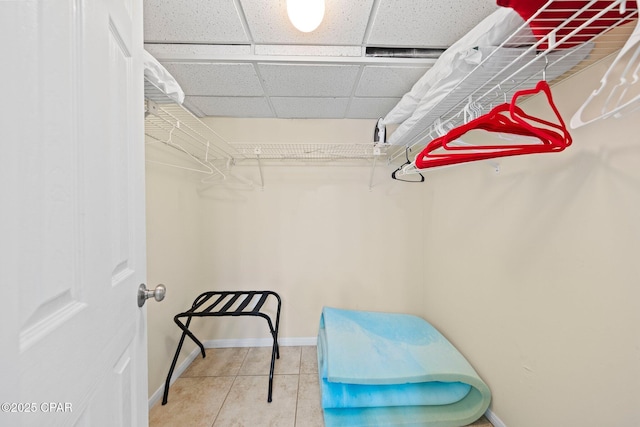 520 N Richard Jackson Blvd Unit 1804, Panama City Beach, FL 32407 - walk in closet featuring a drop ceiling and tile patterned flooring