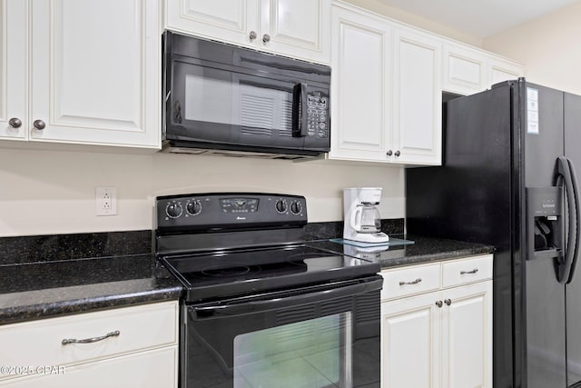 520 N Richard Jackson Blvd Unit 1804, Panama City Beach, FL 32407 - kitchen with black appliances, dark countertops, and white cabinetry