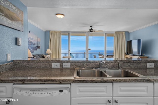14701 Front Beach Rd Unit 2128, Panama City Beach, FL 32413 - kitchen with white dishwasher, ornamental molding, dark countertops, ceiling fan, and a textured wall