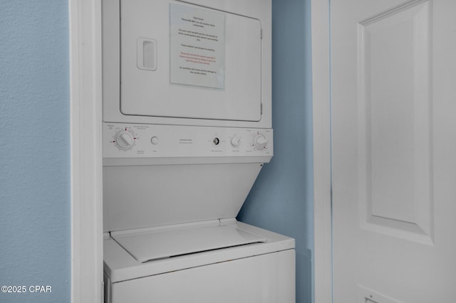 14701 Front Beach Rd Unit 2128, Panama City Beach, FL 32413 - washroom featuring stacked washer / drying machine