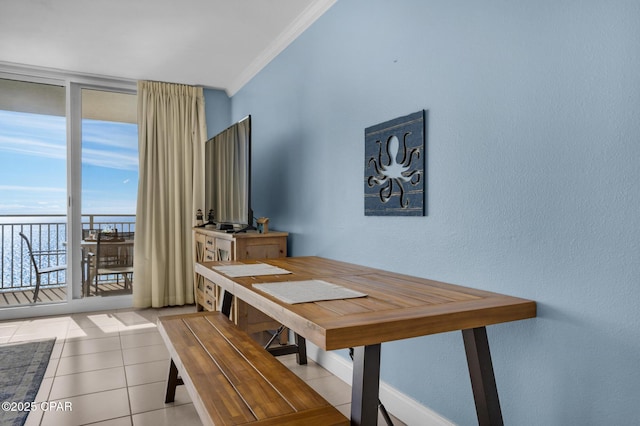 14701 Front Beach Rd Unit 2128, Panama City Beach, FL 32413 - dining room featuring ornamental molding and light tile patterned floors