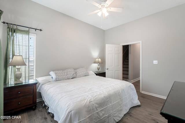 17878 Front Beach Rd Unit B2, Panama City Beach, FL 32413 - bedroom featuring baseboards, wood finished floors, and ceiling fan