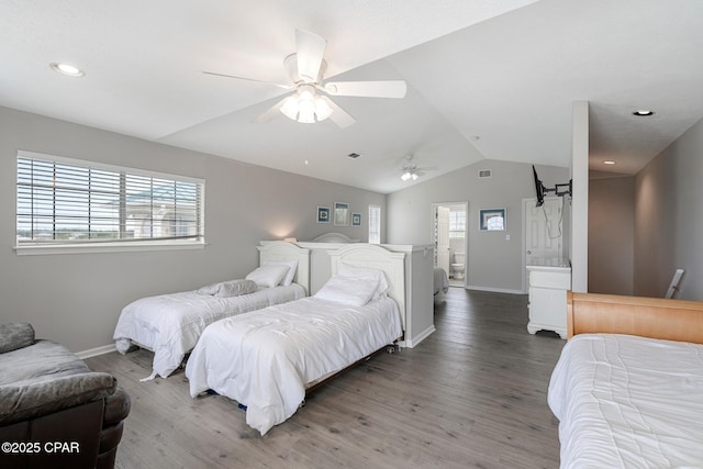 17878 Front Beach Rd Unit B2, Panama City Beach, FL 32413 - bedroom featuring baseboards, lofted ceiling, ceiling fan, and wood finished floors