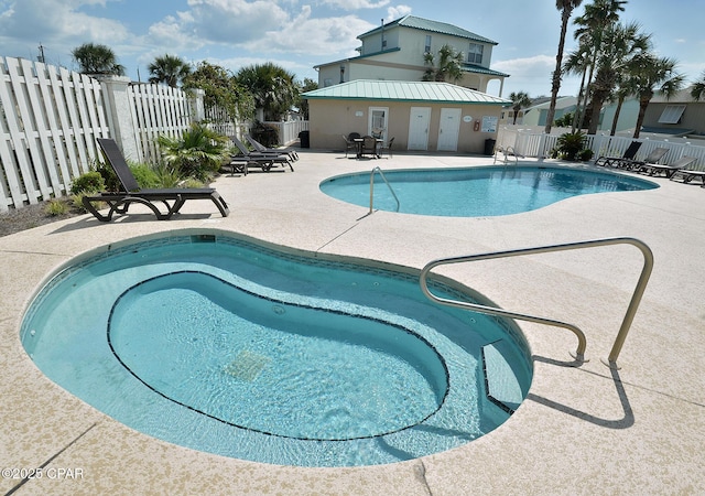17878 Front Beach Rd Unit B2, Panama City Beach, FL 32413 - community pool with a fenced backyard and a patio area