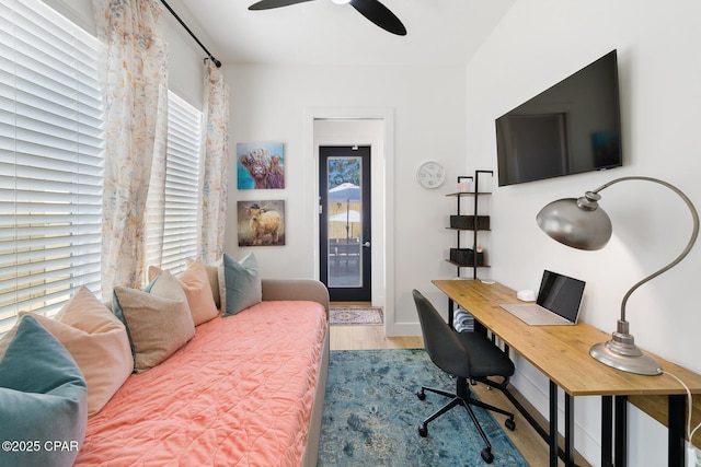 314 Tanaga St, Panama City Beach, FL 32413 - home office featuring wood finished floors, healthy amount of natural light, ceiling fan, and baseboards