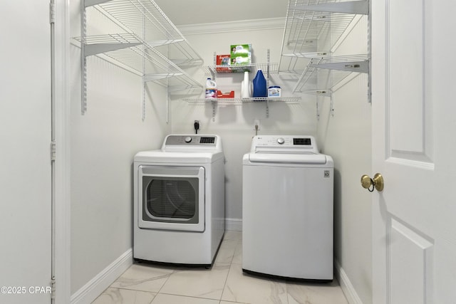 1606 Belmont Blvd, Lynn Haven, FL 32444 - laundry area with washer and clothes dryer, light marble finish flooring, and crown molding