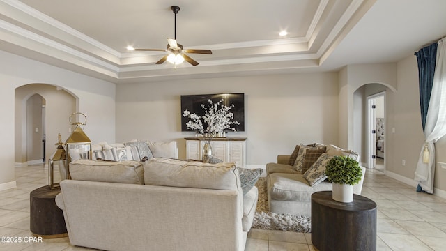 221 S Shoreview Dr, Panama City, FL 32404 - living area featuring arched walkways, ceiling fan, light tile patterned floors, a raised ceiling, and recessed lighting