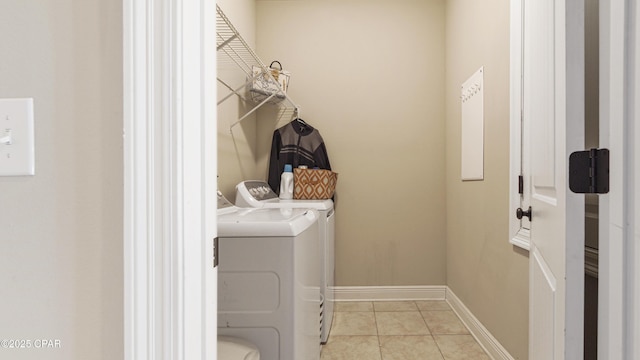 221 S Shoreview Dr, Panama City, FL 32404 - laundry area with independent washer and dryer, tile patterned floors, and baseboards