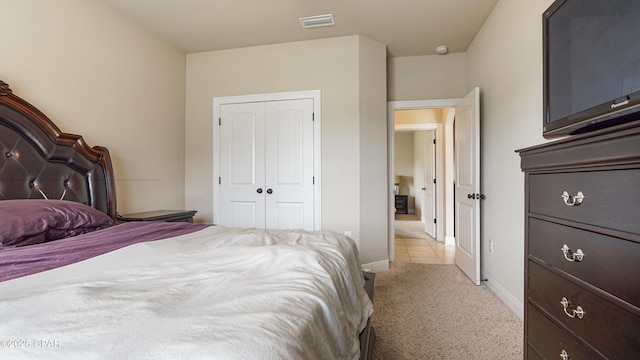 221 S Shoreview Dr, Panama City, FL 32404 - bedroom with light carpet, a closet, and baseboards