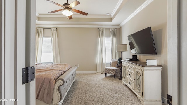 221 S Shoreview Dr, Panama City, FL 32404 - bedroom with crown molding, light carpet, a raised ceiling, baseboards, and ceiling fan