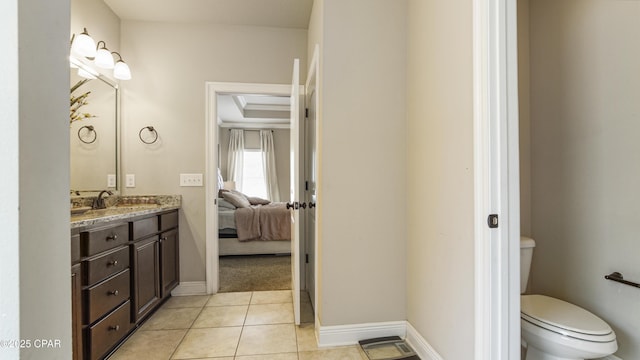 221 S Shoreview Dr, Panama City, FL 32404 - ensuite bathroom with vanity, toilet, tile patterned flooring, and baseboards