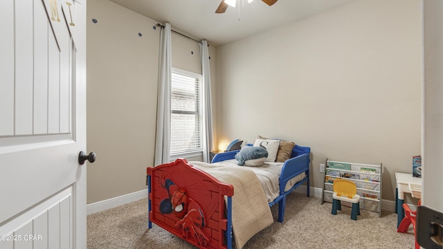 221 S Shoreview Dr, Panama City, FL 32404 - bedroom with carpet flooring, baseboards, and ceiling fan