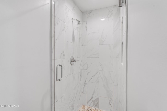 bathroom featuring a stall shower