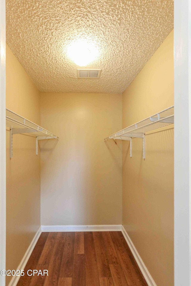 911 Indiana Ave, Lynn Haven, FL 32444 - spacious closet with wood finished floors