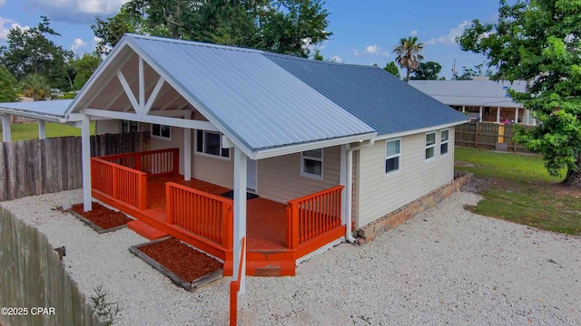 911 Indiana Ave, Lynn Haven, FL 32444 - rear view of property featuring a metal roof