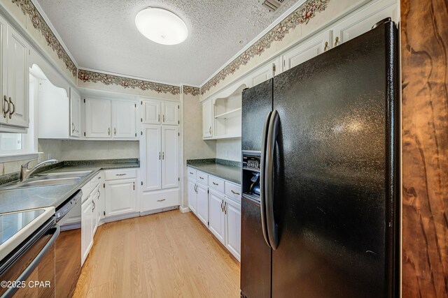 kitchen featuring black fridge with ice dispenser, white cabinetry, dishwasher, a textured ceiling, and dark countertops