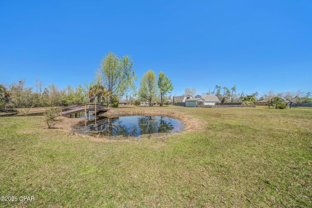 view of yard with a water view