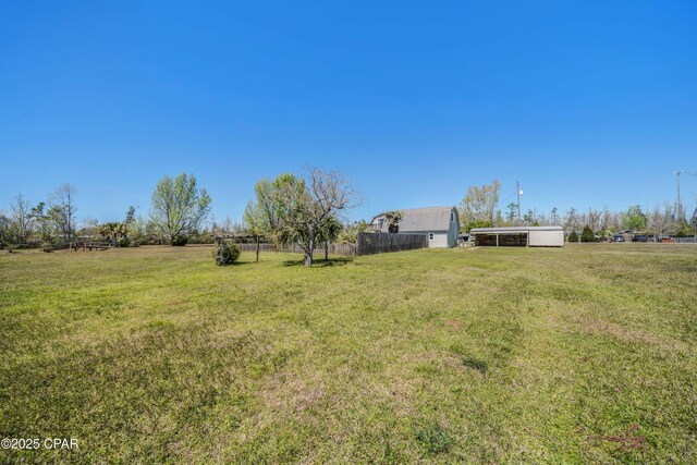 view of yard with fence