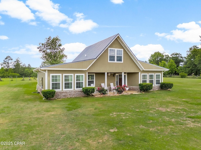 2187 Mayo Rd, Grand Ridge, FL 32442 - view of front facade with a front lawn and a porch