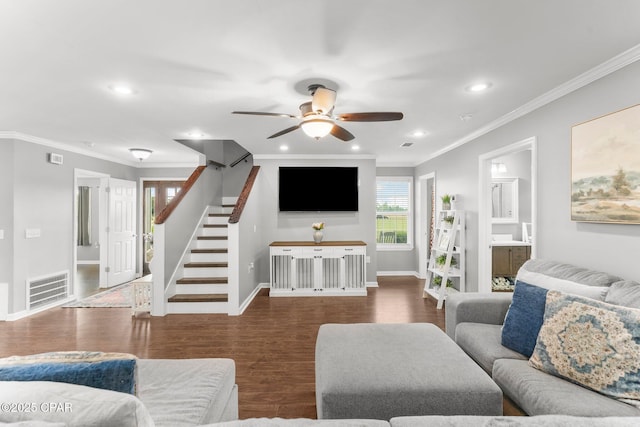 2187 Mayo Rd, Grand Ridge, FL 32442 - living area with ceiling fan, wood finished floors, crown molding, stairway, and baseboards