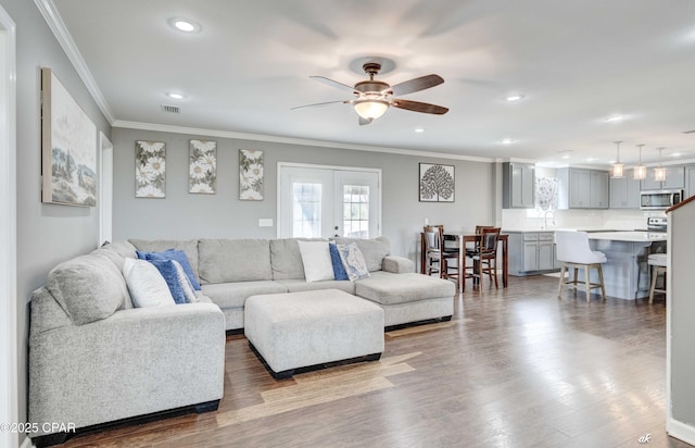 2187 Mayo Rd, Grand Ridge, FL 32442 - living room with ornamental molding, ceiling fan, dark wood-style floors, recessed lighting, and french doors