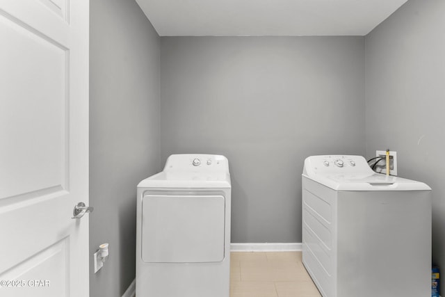 2187 Mayo Rd, Grand Ridge, FL 32442 - laundry area with washer and dryer and baseboards