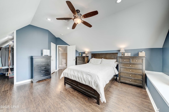 2187 Mayo Rd, Grand Ridge, FL 32442 - bedroom with vaulted ceiling, wood finished floors, a ceiling fan, recessed lighting, and baseboards