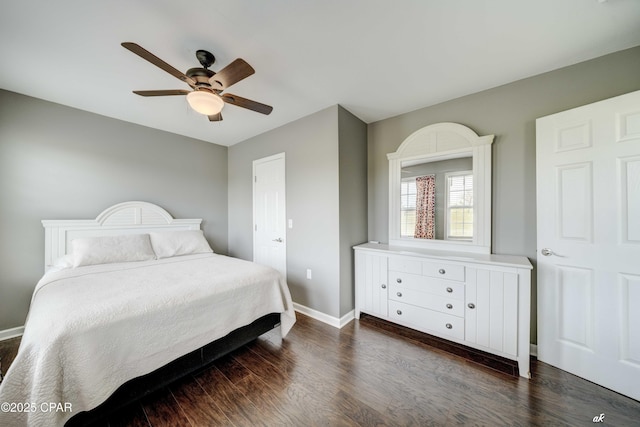 2187 Mayo Rd, Grand Ridge, FL 32442 - bedroom with dark wood-style floors, baseboards, and a ceiling fan