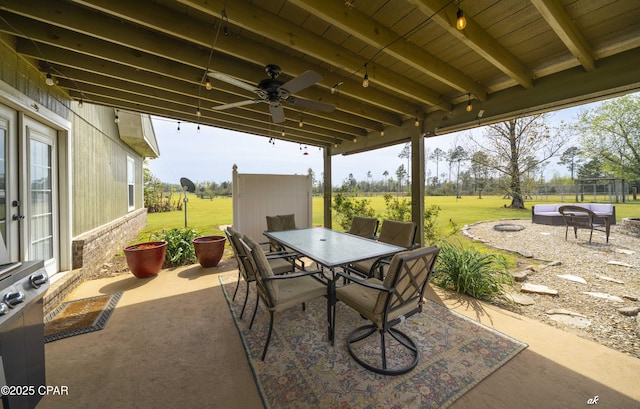 2187 Mayo Rd, Grand Ridge, FL 32442 - view of patio featuring outdoor dining space and ceiling fan