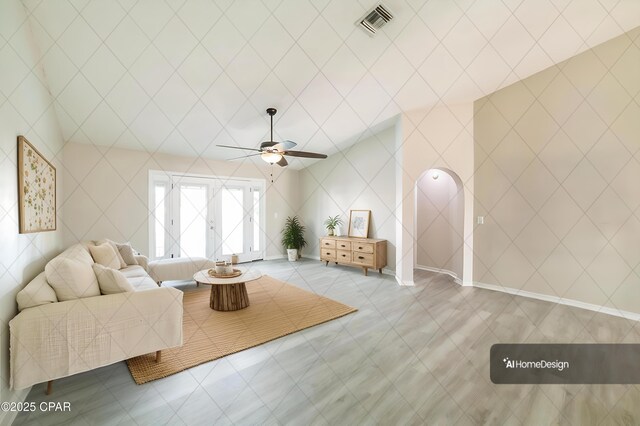 living area featuring ceiling fan, tile patterned flooring, and visible vents